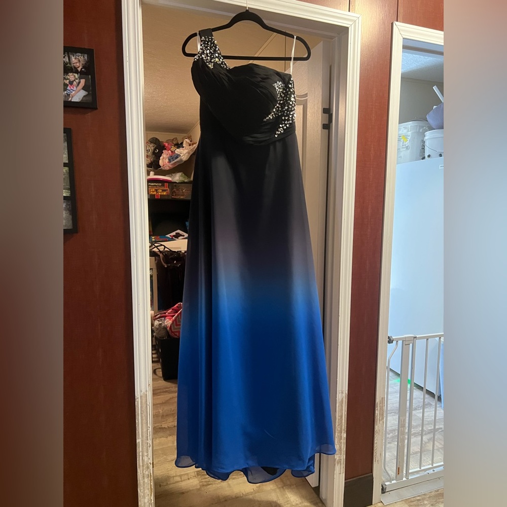 Beautiful gown for anything formal.Black that transition the blue w/rhinestones